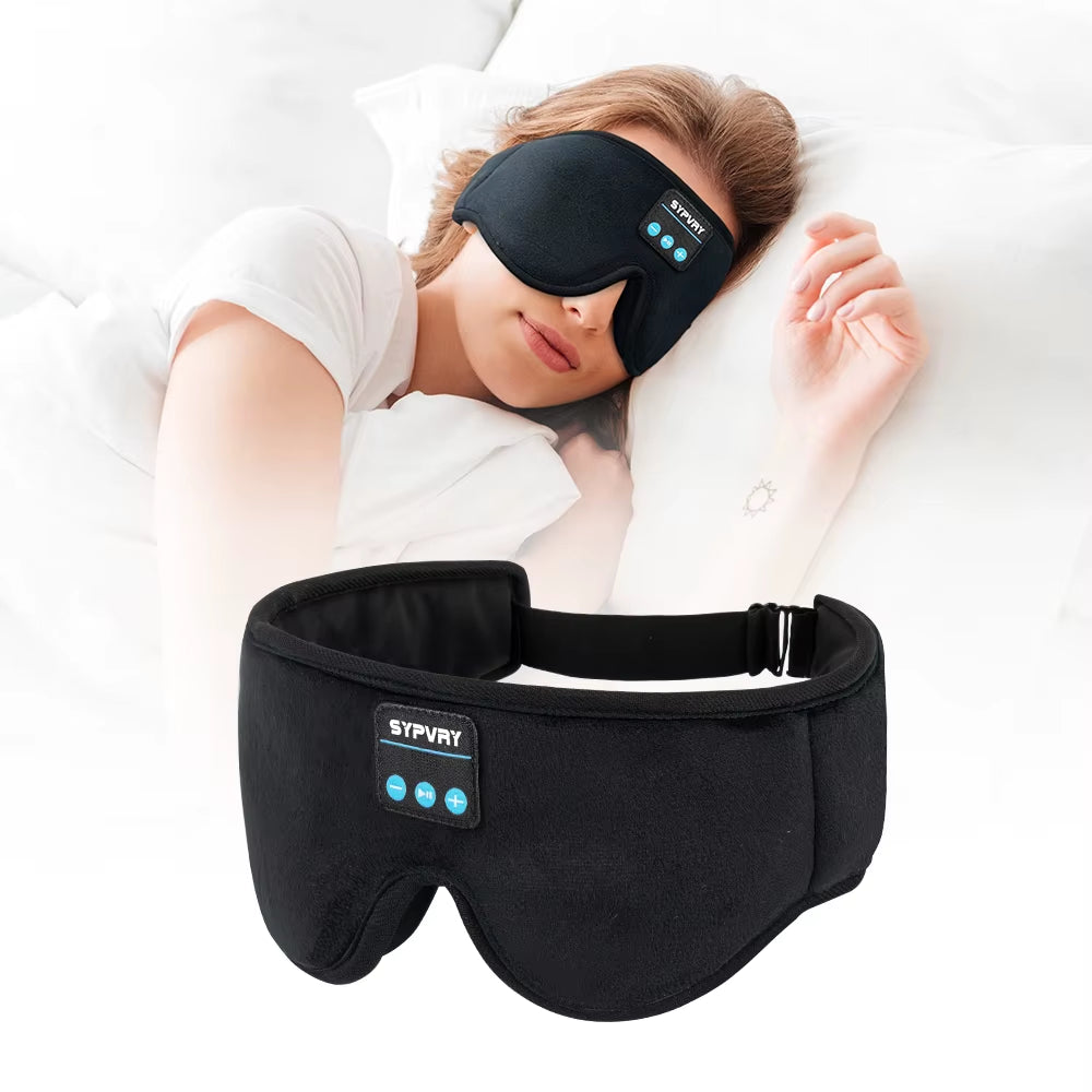 DreamTune 3D Bluetooth Sleep Mask worn by a woman resting comfortably on a bed.